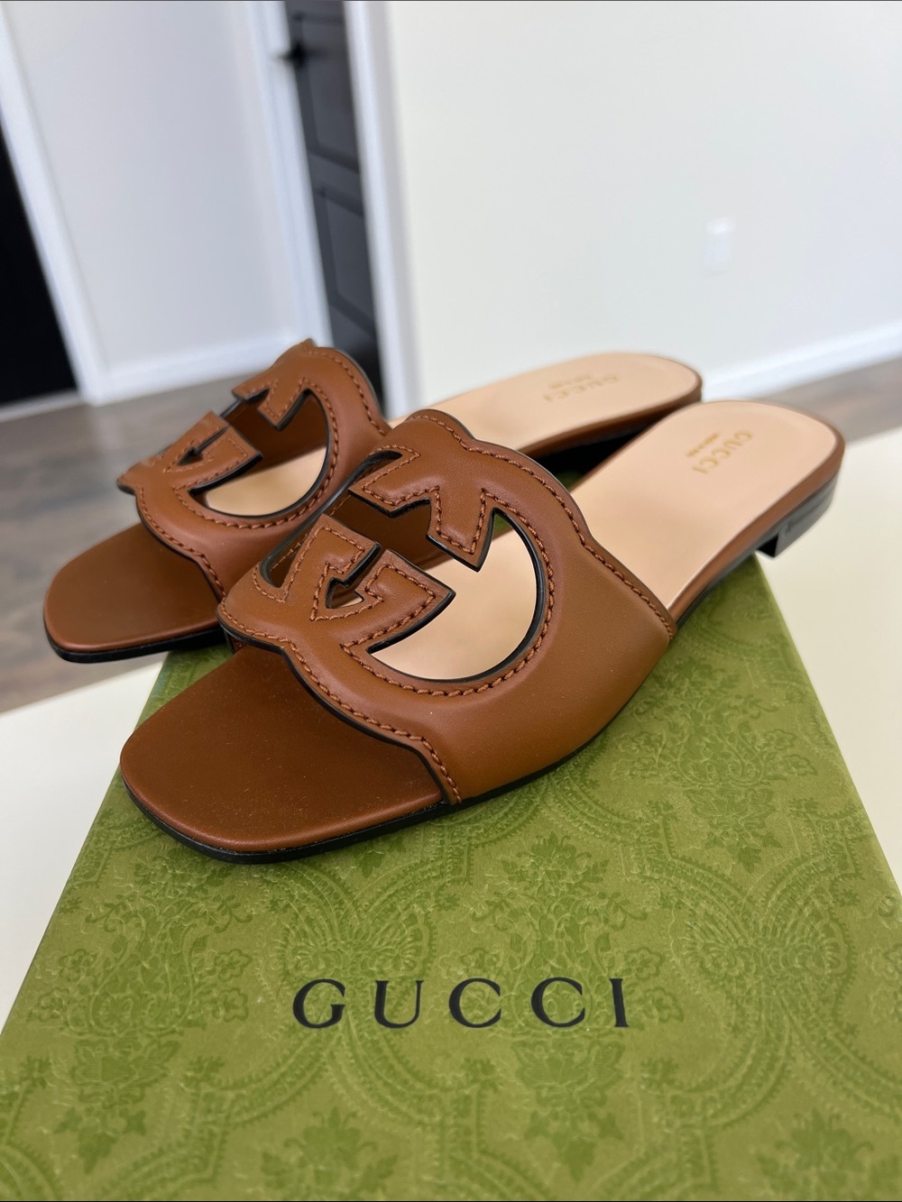 Gucci interlocking g logo cutout open toe brown leather slide sandals 36.5